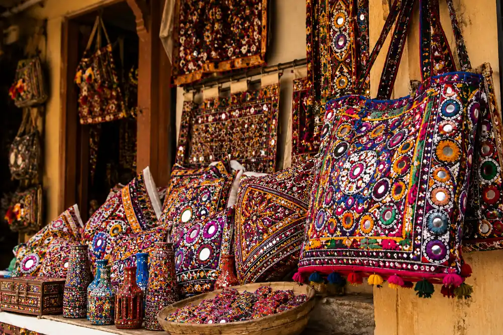 Vibrant traditional Kutchi handicraft village market with heritage textiles